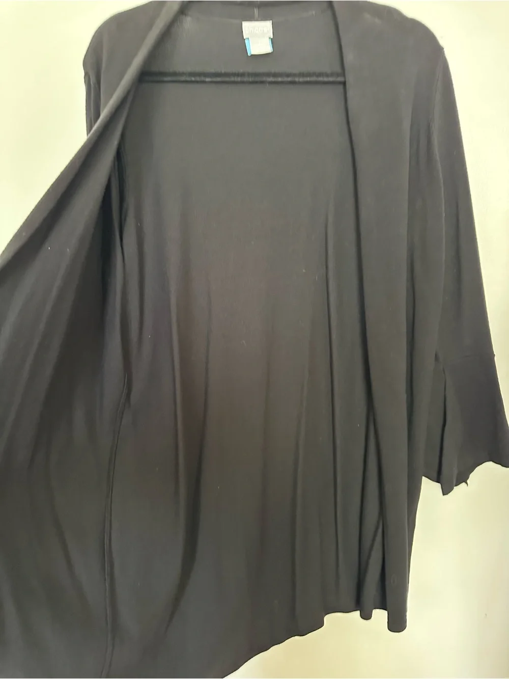 Chico's Black Open-Front tunic length Cardigan with tulip sleeves.